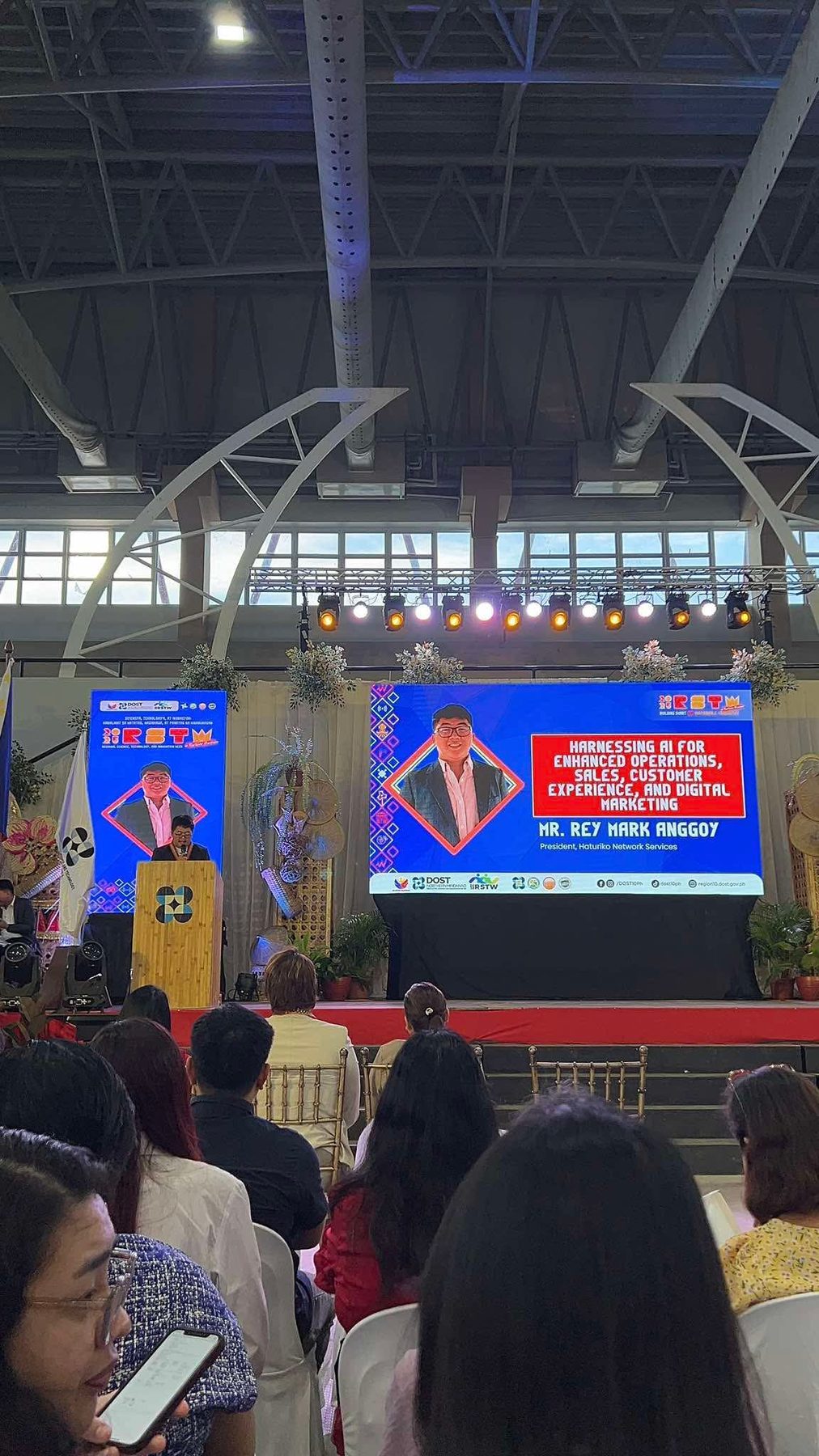 Rey Mark Anggoy on stage at the RSTW DOST talk on AI