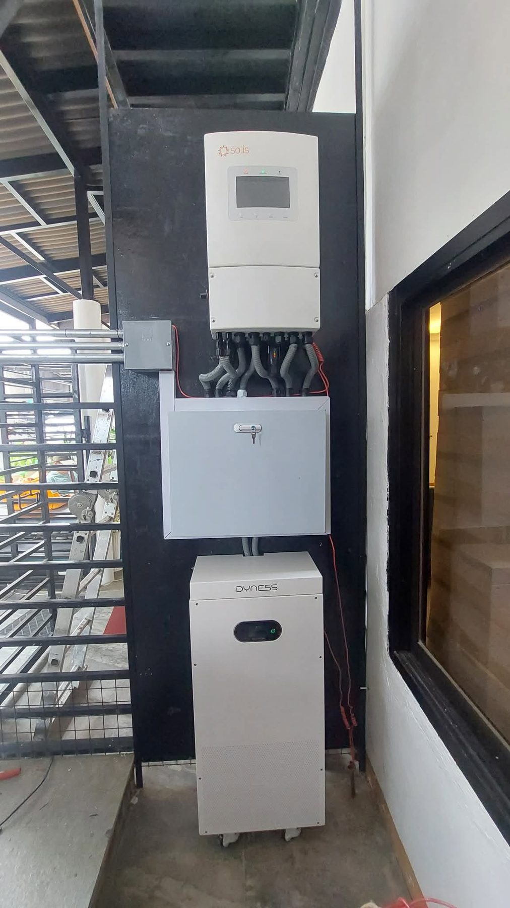 Solar inverter and battery mounted on the studio wall